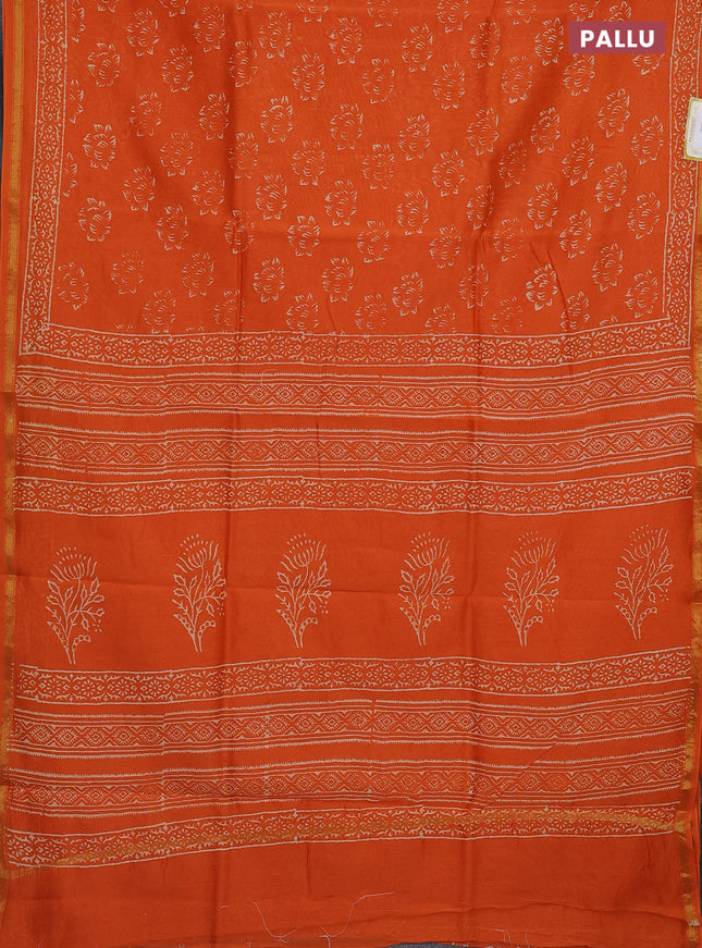 Chanderi bagru saree orange with allover dfloral butta prints and small zari woven border