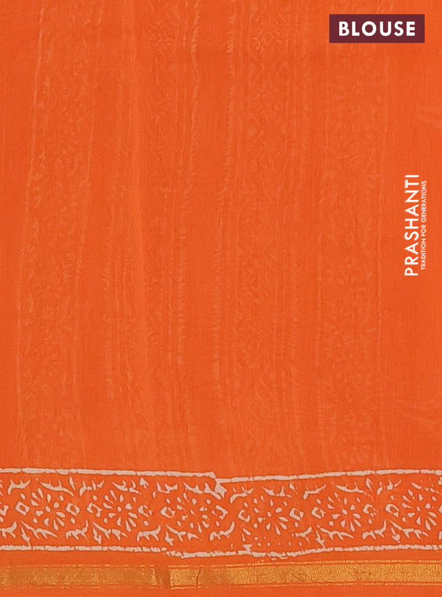 Chanderi bagru saree orange with allover dfloral butta prints and small zari woven border