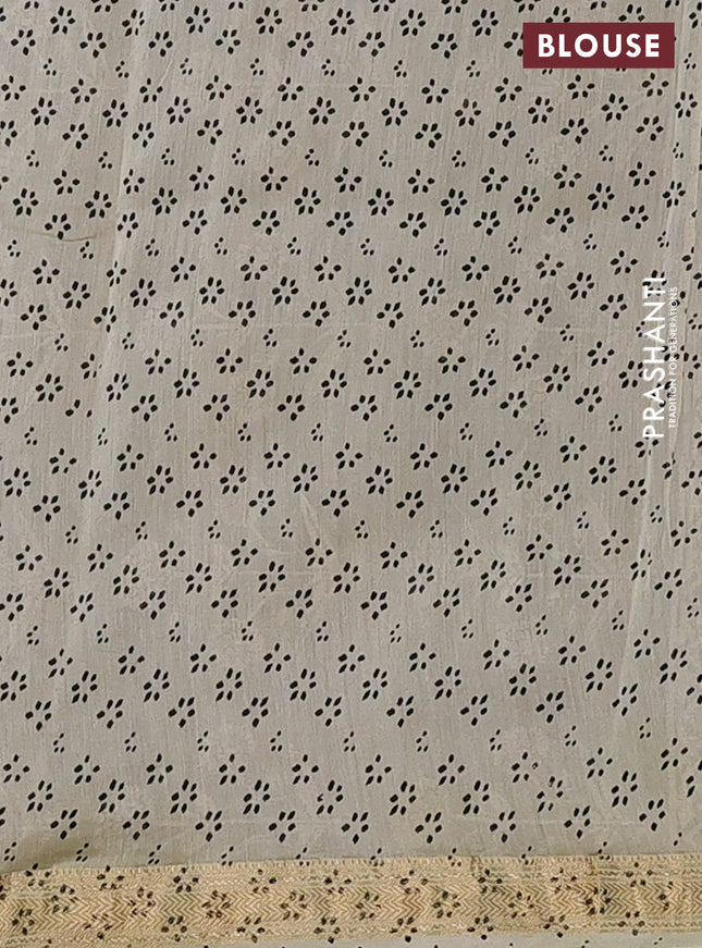 Chanderi bagru saree cream sap green and black with allover geometric prints and mageshwari border