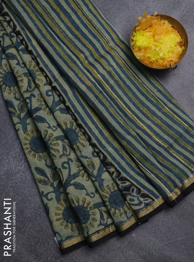Chanderi bagru saree pastel green and black with allover kalamkari prints and small zari woven border