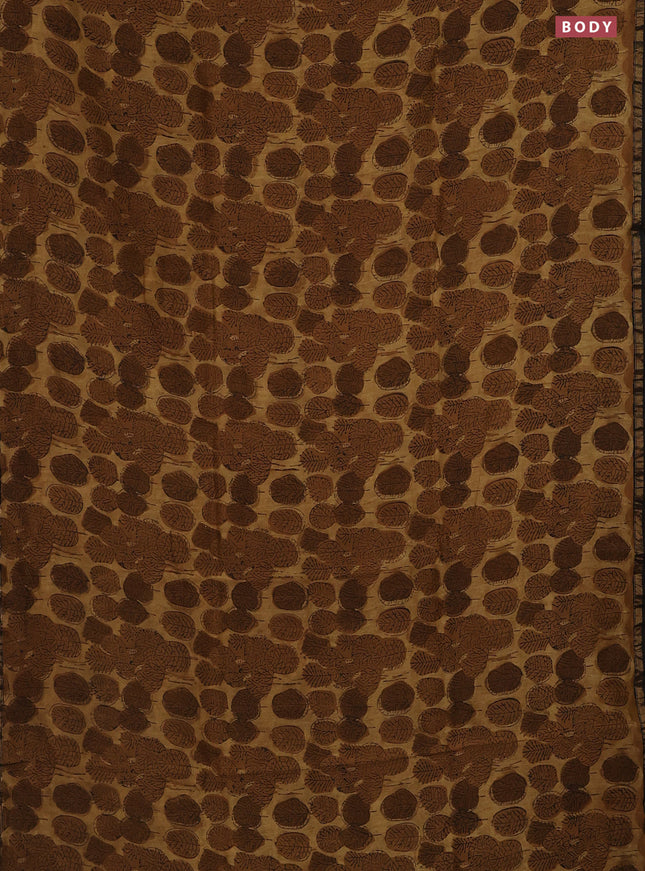 Chanderi bagru saree sandal and brown with allover leaf prints and small zari woven border