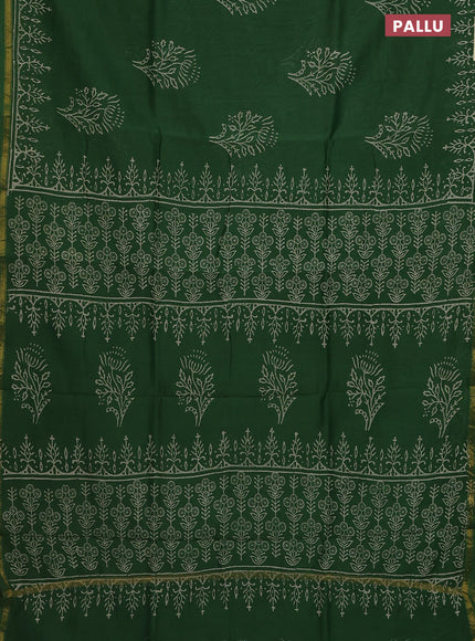 Chanderi bagru saree green with floral butta prints and small zari woven border