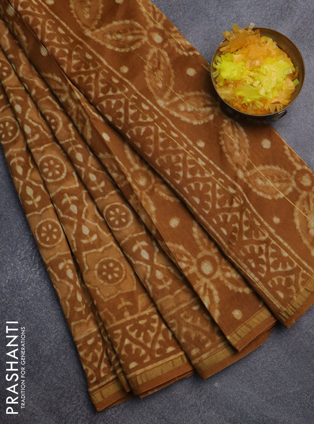 Chanderi bagru saree dark mustard with allover batik prints and small zari woven border