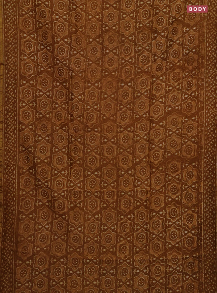 Chanderi bagru saree dark mustard with allover batik prints and small zari woven border