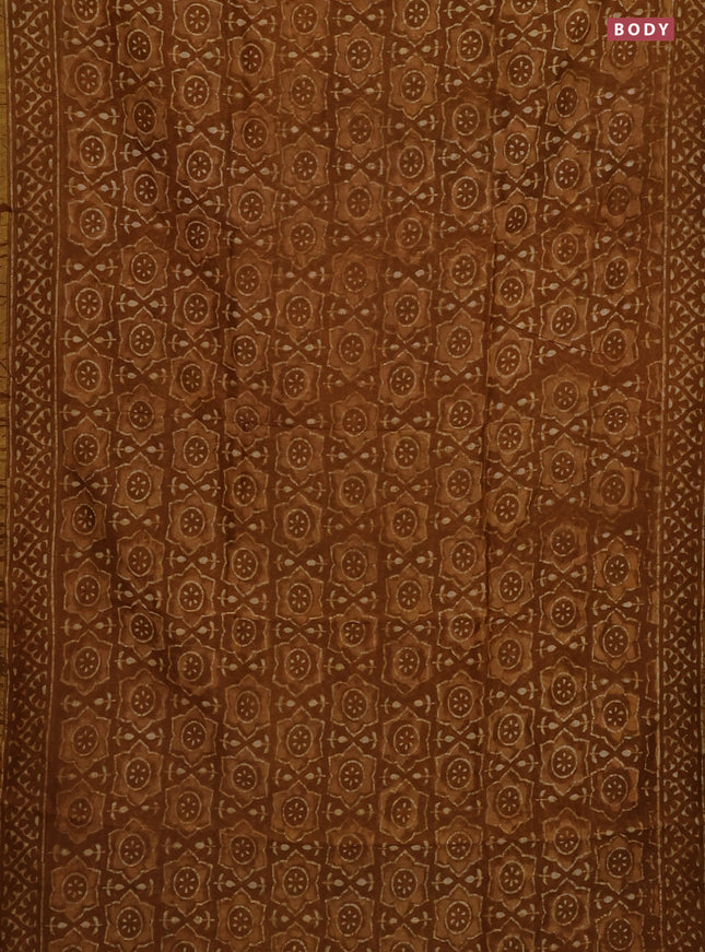 Chanderi bagru saree dark mustard with allover batik prints and small zari woven border