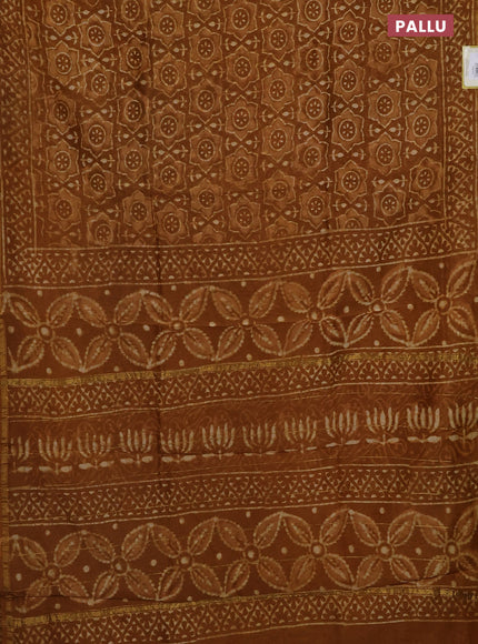 Chanderi bagru saree dark mustard with allover batik prints and small zari woven border