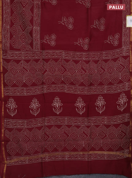 Chanderi bagru saree maroon with floral butta prints and small zari woven border