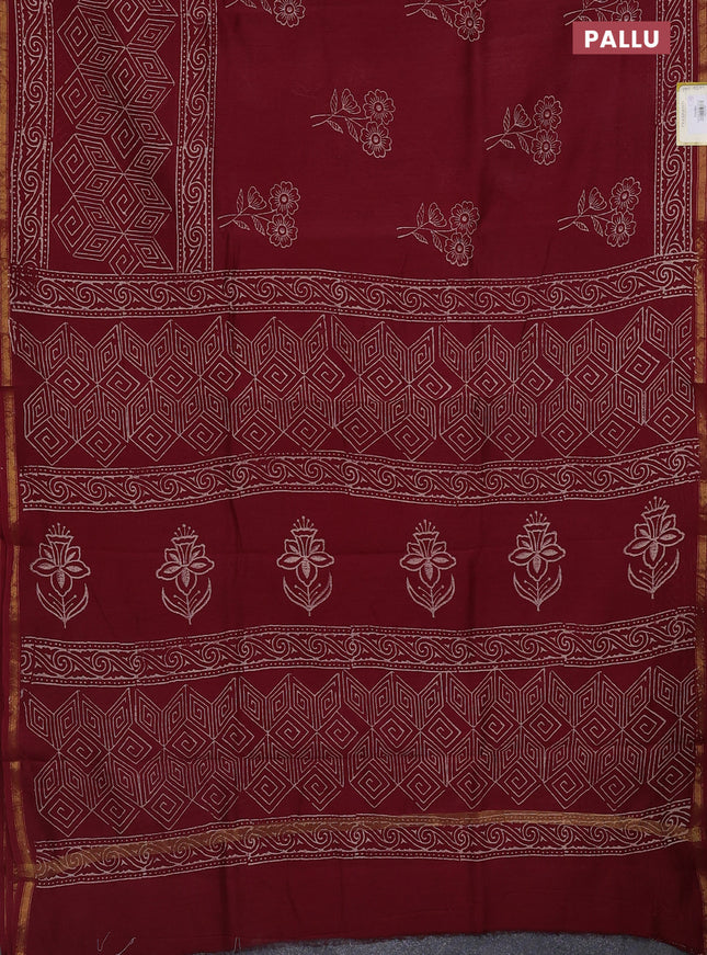 Chanderi bagru saree maroon with floral butta prints and small zari woven border