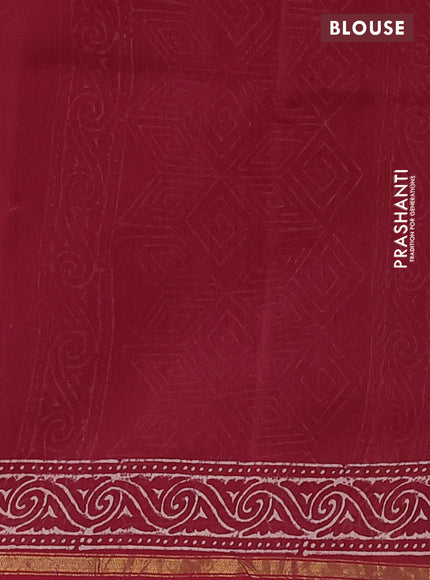 Chanderi bagru saree maroon with floral butta prints and small zari woven border