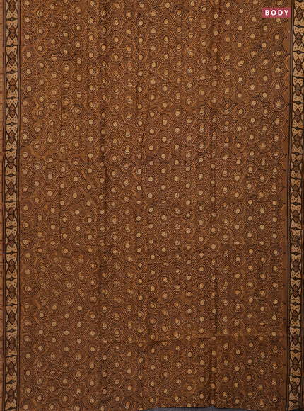 Chanderi bagru saree pastel brown and pale orange with allover prints and small zari woven border