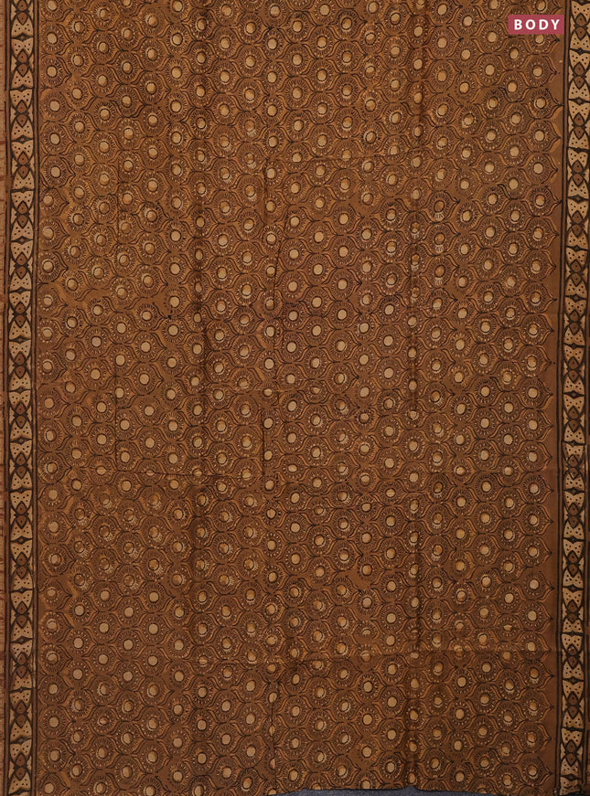 Chanderi bagru saree pastel brown and pale orange with allover prints and small zari woven border