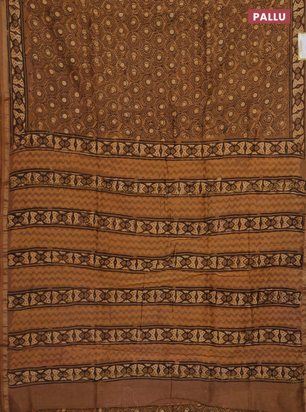 Chanderi bagru saree pastel brown and pale orange with allover prints and small zari woven border