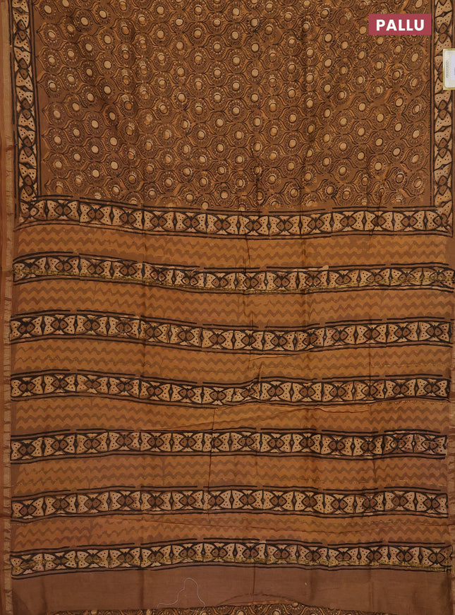 Chanderi bagru saree pastel brown and pale orange with allover prints and small zari woven border
