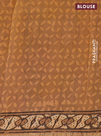 Chanderi bagru saree pastel brown and pale orange with allover prints and small zari woven border