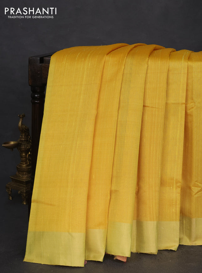 Pure raw silk saree yellow and pink with plain body and ikat weaves pallu