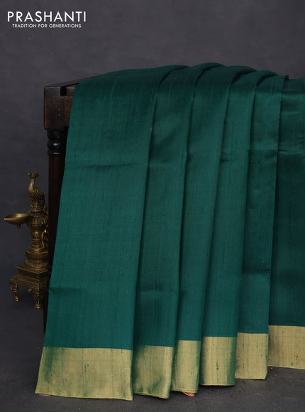 Pure raw silk saree green and magenta pink with plain body and ikat weaves pallu