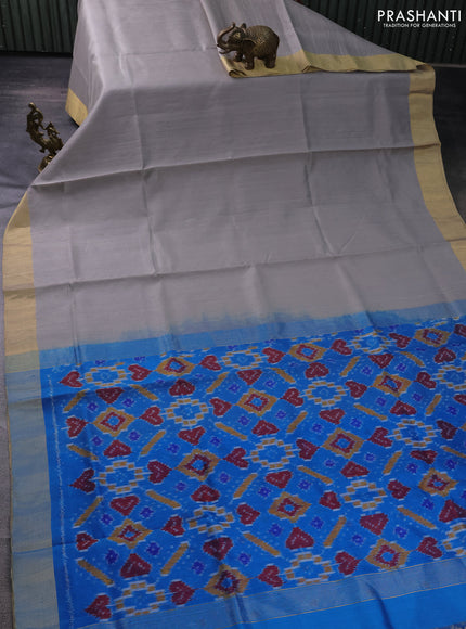 Pure raw silk saree grey and cs blue with plain body and ikat weaves pallu