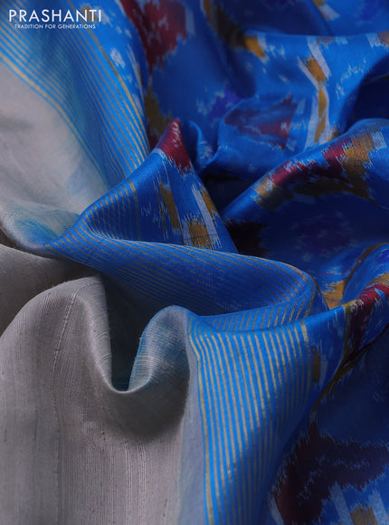 Pure raw silk saree grey and cs blue with plain body and ikat weaves pallu