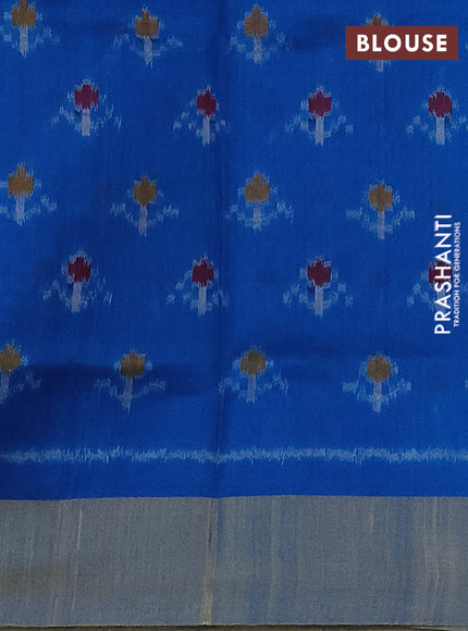 Pure raw silk saree grey and cs blue with plain body and ikat weaves pallu