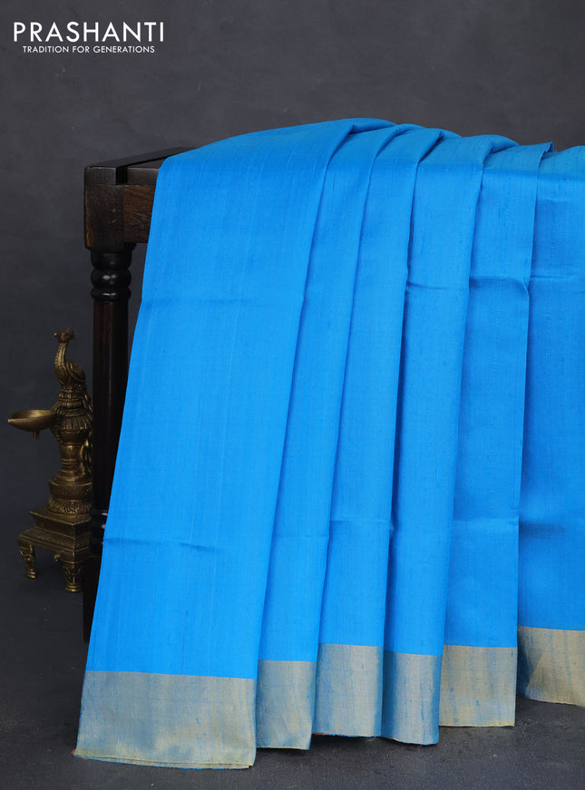 Pure raw silk saree blue and maroon with plain body and ikat weaves pallu