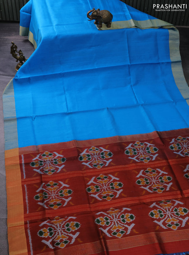 Pure raw silk saree blue and maroon with plain body and ikat weaves pallu