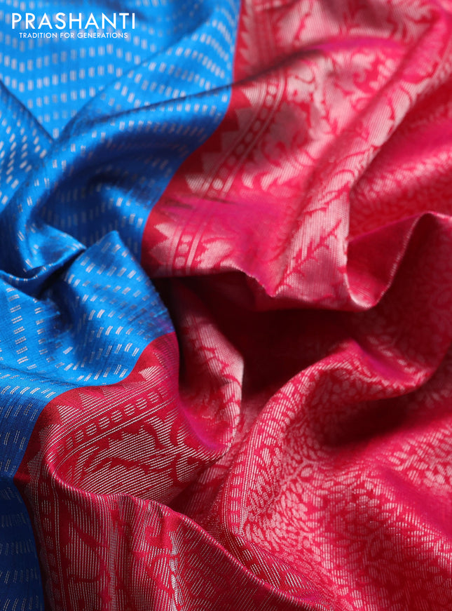 Pure raw silk saree cs blue and reddish pink with allover silver & gold zari weaves and silver zari woven border