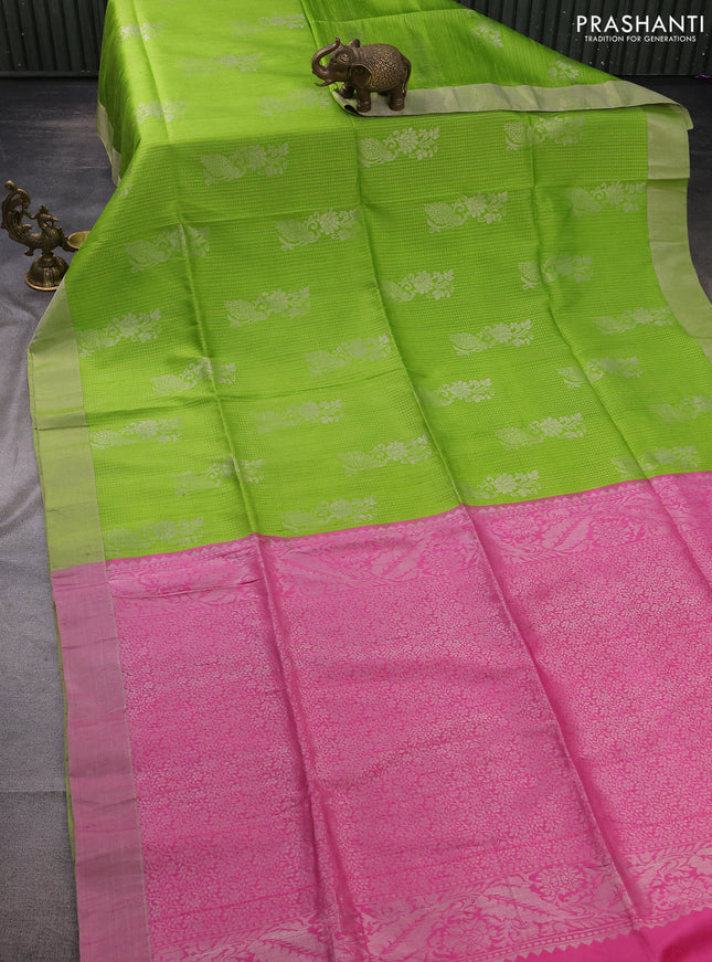 Pure raw silk saree light green and pink with allover silver zari weaves and zari woven border