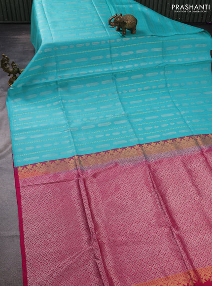 Pure raw silk saree teal blue and pink with allover silver & gold zari weaves in borderless style