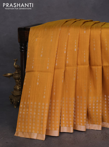 Pure raw silk saree mustard yellow and pink with silver zari woven buttas and silver zari woven piping border
