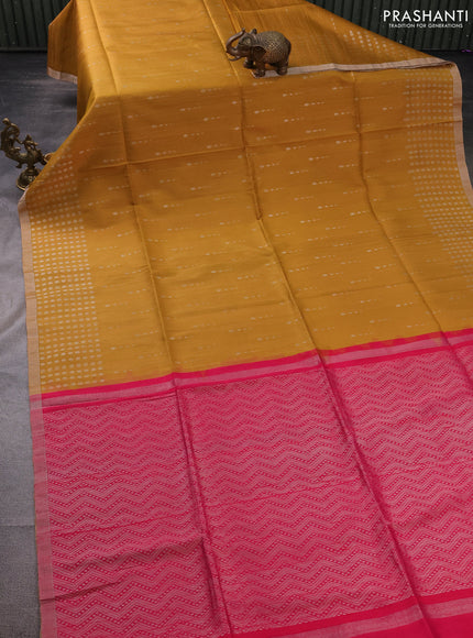 Pure raw silk saree mustard yellow and pink with silver zari woven buttas and silver zari woven piping border