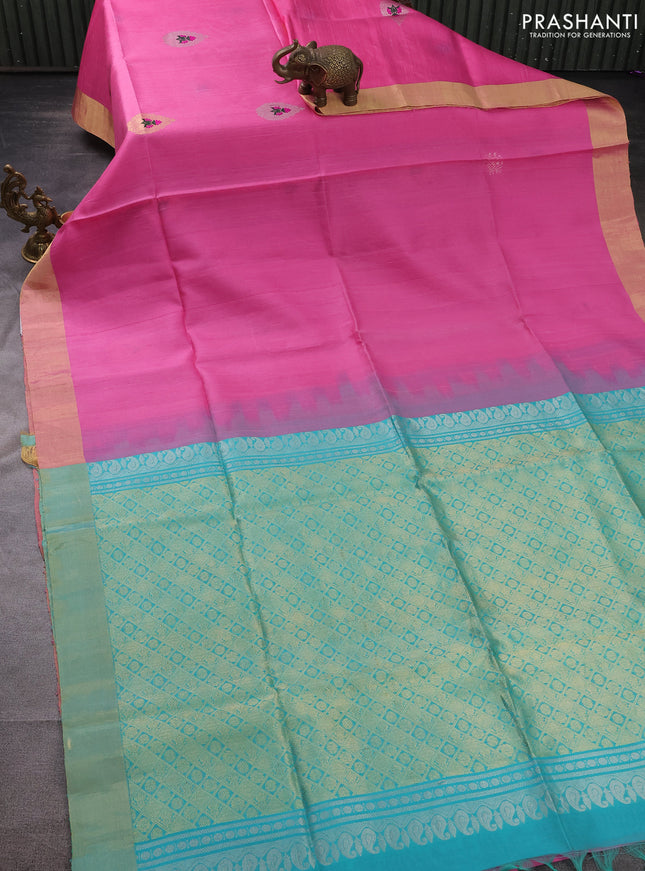 Pure raw silk saree light pink and teal blue with plain body and zari woven border