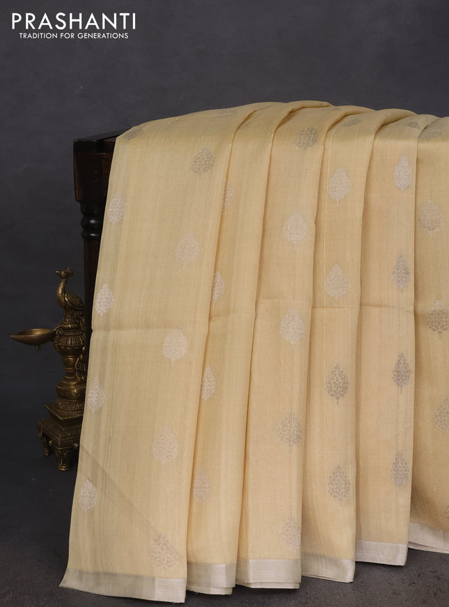 Pure raw silk saree sandal and light pink with silver zari woven buttas and silver zari woven border