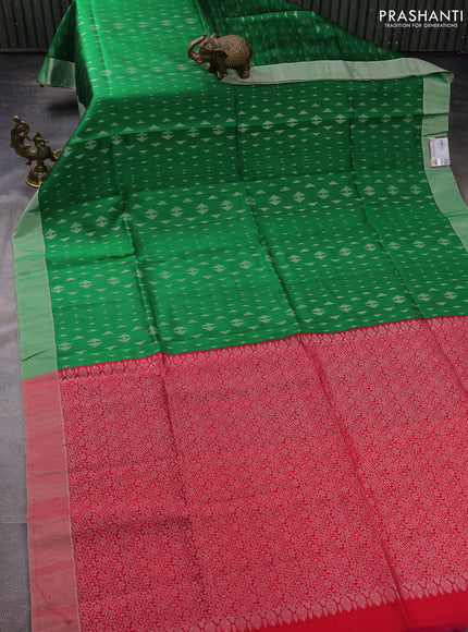 Pure raw silk saree green and reddish pink with allover silver zari geometric weaves and silver zari woven border