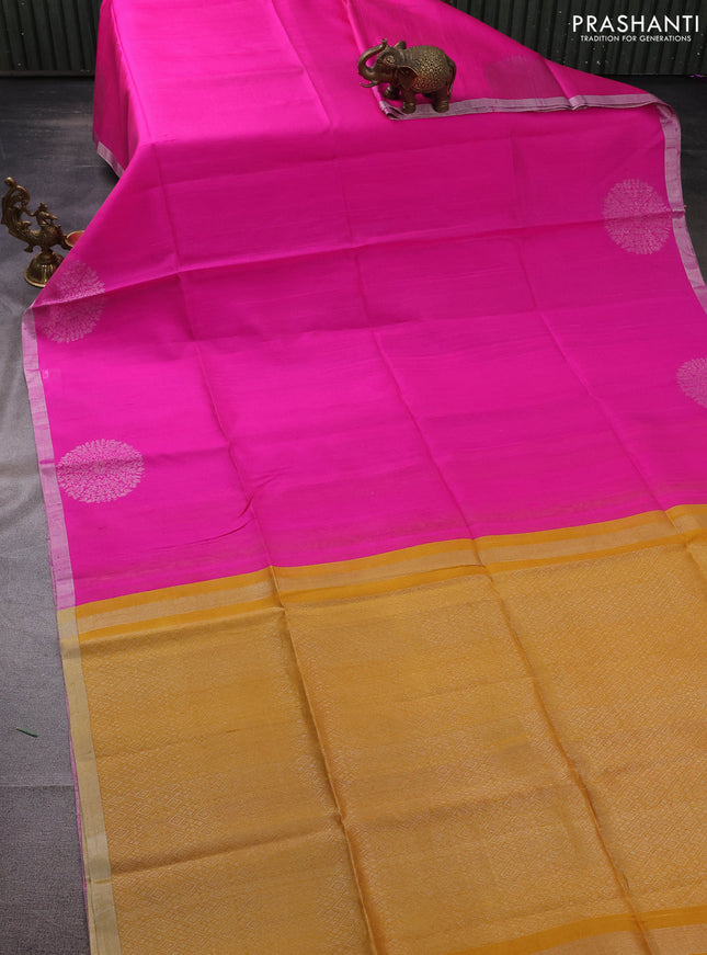 Pure raw silk saree candy pink and mustard yellow with plain body and silver zari woven butta border