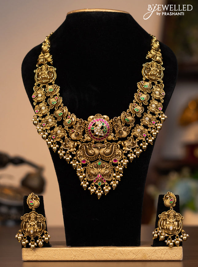 Antique double layer necklace lakshmi pendant with jadau kundan stones and pearl & golden beads hanging