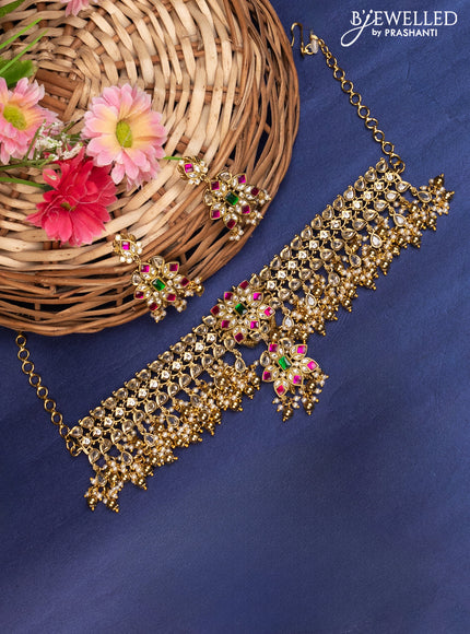 Antique choker with kundan stones and golden beads hanging