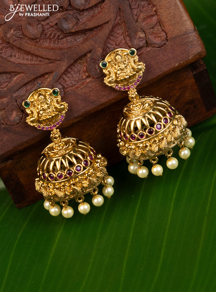 Antique jhumka lakshmi design with kemp stones and pearl hangings