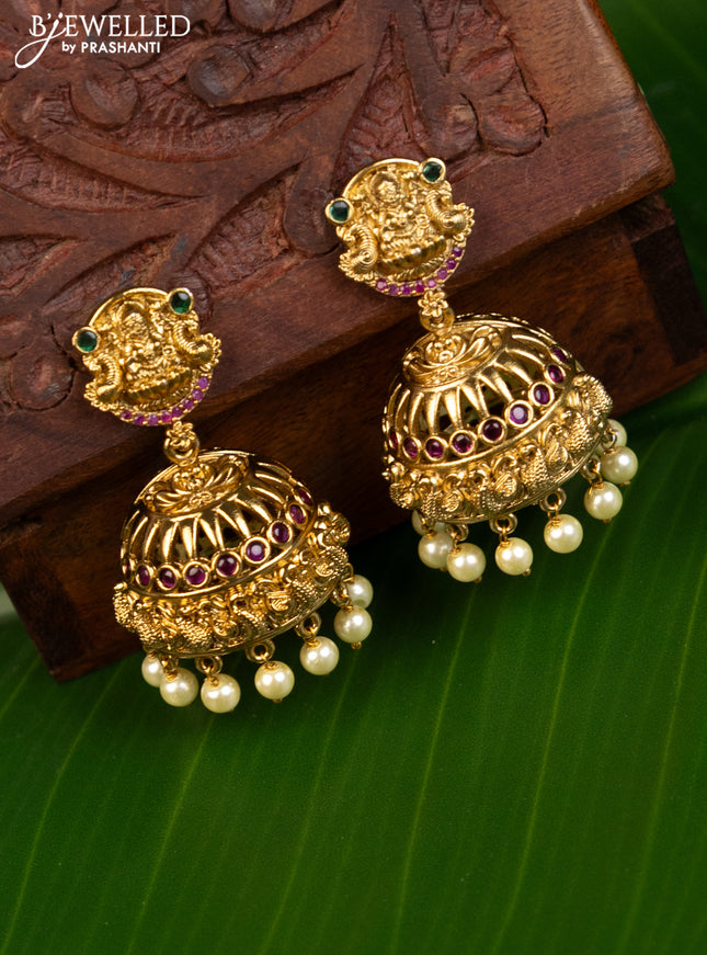 Antique jhumka lakshmi design with kemp stones and pearl hangings