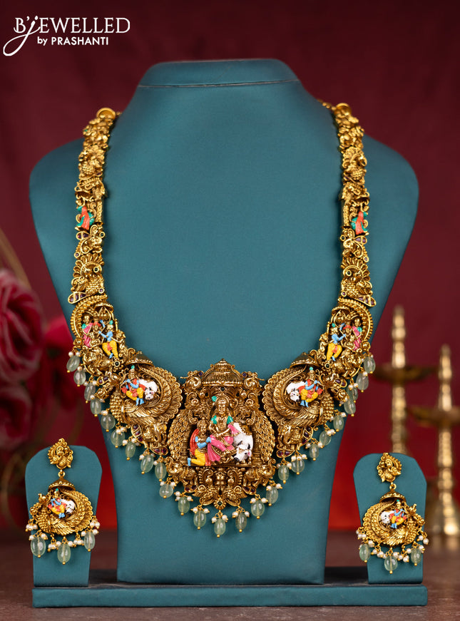 Antique enamel lakshmi pendant haram with kemp stones and green beads & pearl hanging