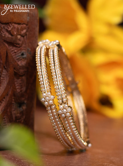Pearl bangles with pearls in gold finish