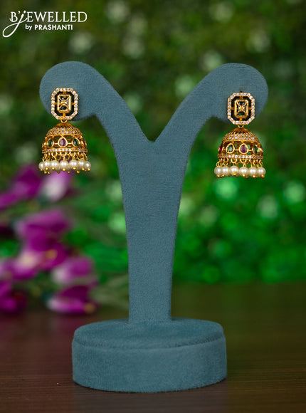 Antique jhumkas with kemp & cz stones and pearl hangings