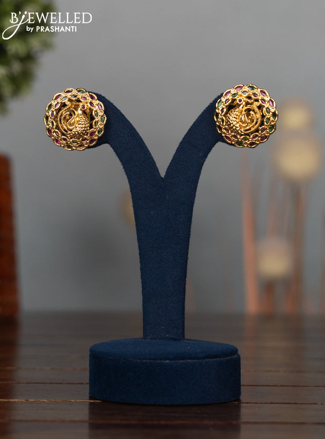 Antique earrings with peacock design and kemp stones