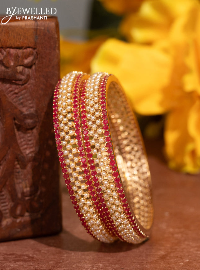 Pearl Bangles with ruby stones pearls in gold finish