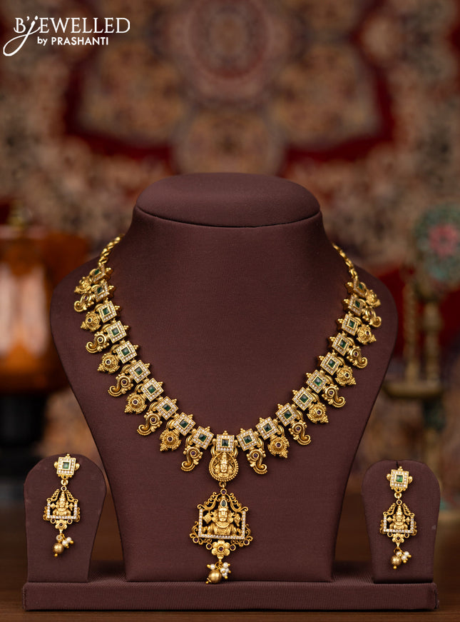 Antique necklace tirupati balaji design with emerald & cz stones and pearl & golden beads hangings