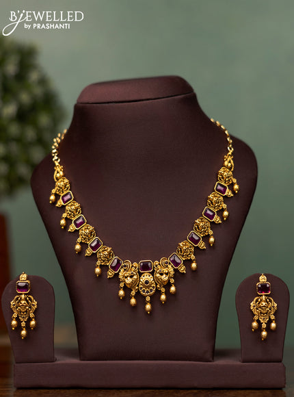 Antique necklace lakshmi design with ruby stones and golden beads hangings