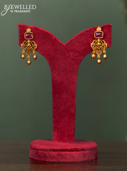 Antique necklace lakshmi design with ruby stones and golden beads hangings