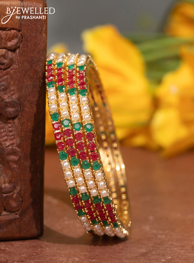 Pearl Bangles with kemp stones pearls in gold finish
