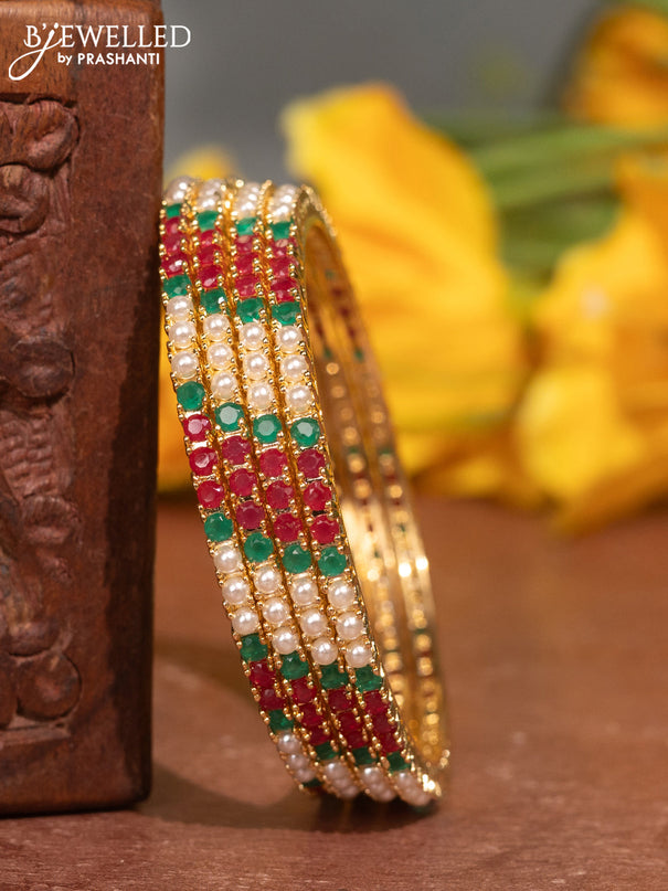 Pearl Bangles with kemp stones pearls in gold finish
