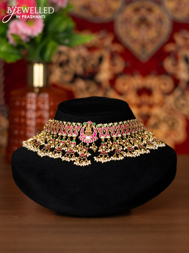 Jadau choker lakshmi & peacock design with jadau kemp,kundan stone and golden beads and pearl hangings