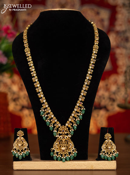 Antique haram lakshmi pendant with kemp & cz stones and pearl & mint green beads hangings